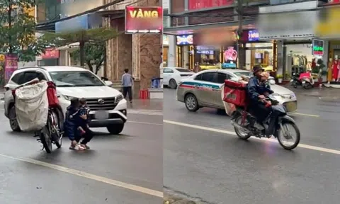 Nghẹn ngào hình ảnh ông bố shipper bế con rong ruổi phố phường đi giao hàng