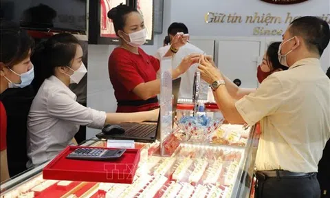 Giá vàng trong nước đảo chiều tăng, tỷ giá trung tâm giảm mạnh