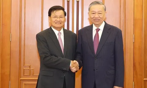 Quyết tâm gìn giữ, vun đắp quan hệ Việt Nam-Lào mãi mãi xanh tươi, liên tục phát triển